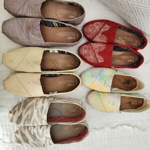 5 pairs of Tom's shoes in good condition.
